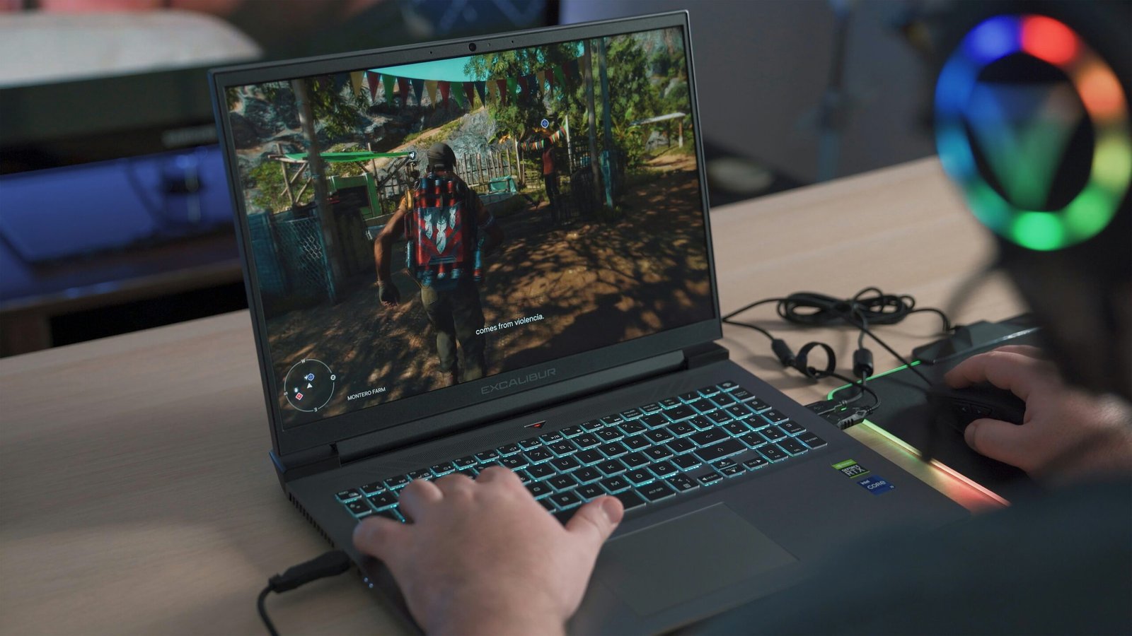 أهم الألعاب الإلكترونية الصادرة في 2024 1 A person playing a video game on a laptop